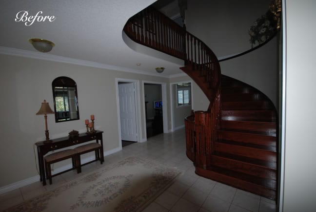 The front entry and staircase at our Lamoka home in Oakville was dark and gloomy. The dark lacquered staircase absorbed all of the light in this poorly lit space. Keep reading to view this space after the Lifestyles makeover!